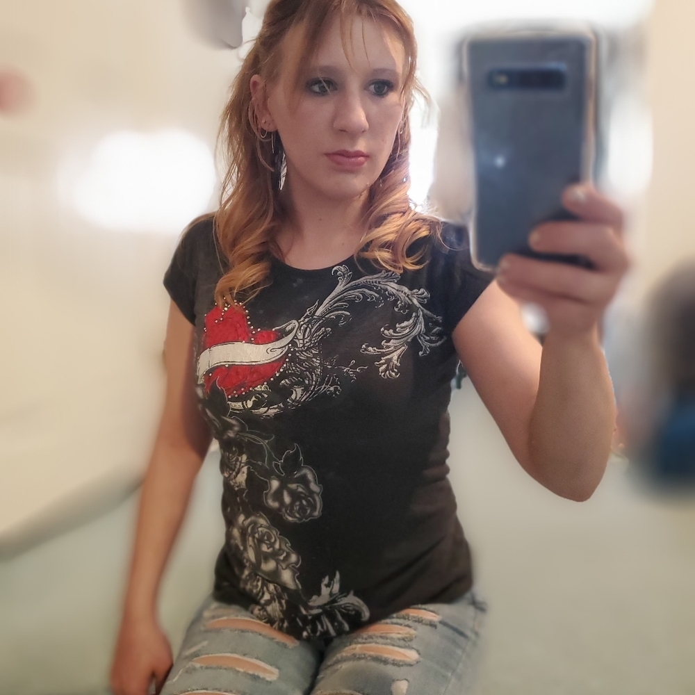 A black Ritual shirt w/ cool rose and tribal